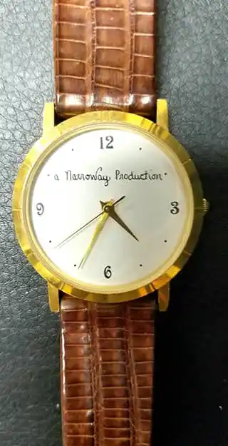 watch with "a NarroWay Production" written on it