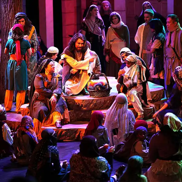 Jesus teaching to crowd with children